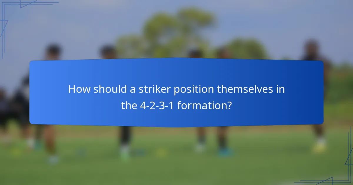 How should a striker position themselves in the 4-2-3-1 formation?